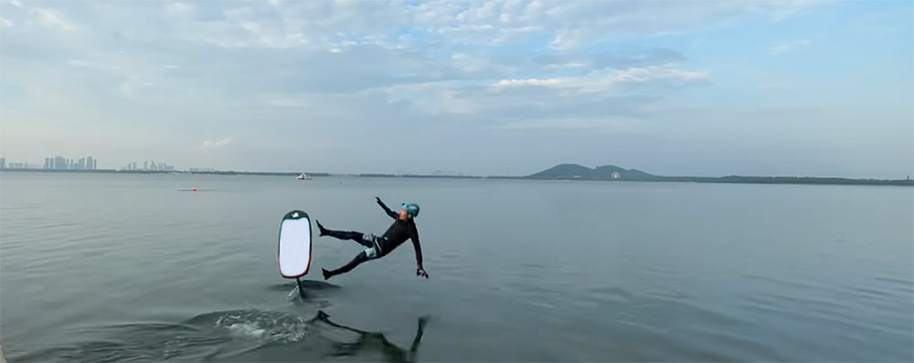 riding hydrofoil surfboard practice