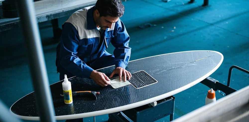 Applying Carbon Fiber Patches on the surfboard